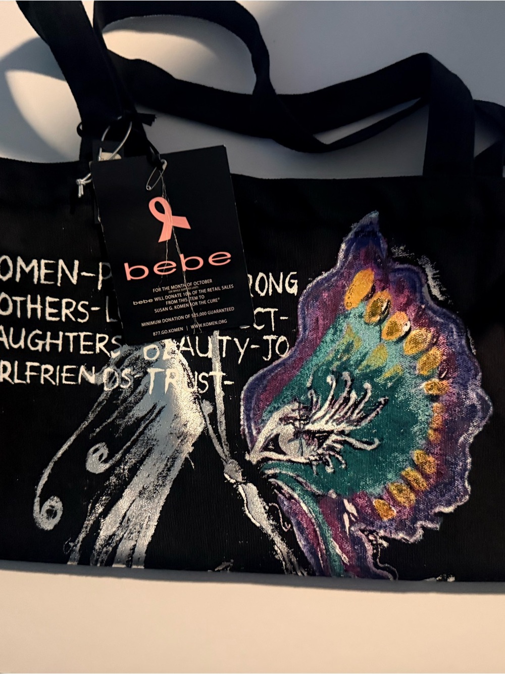 bebe Breast Cancer Black Tote with Colorful Butterfly Wing Graphic